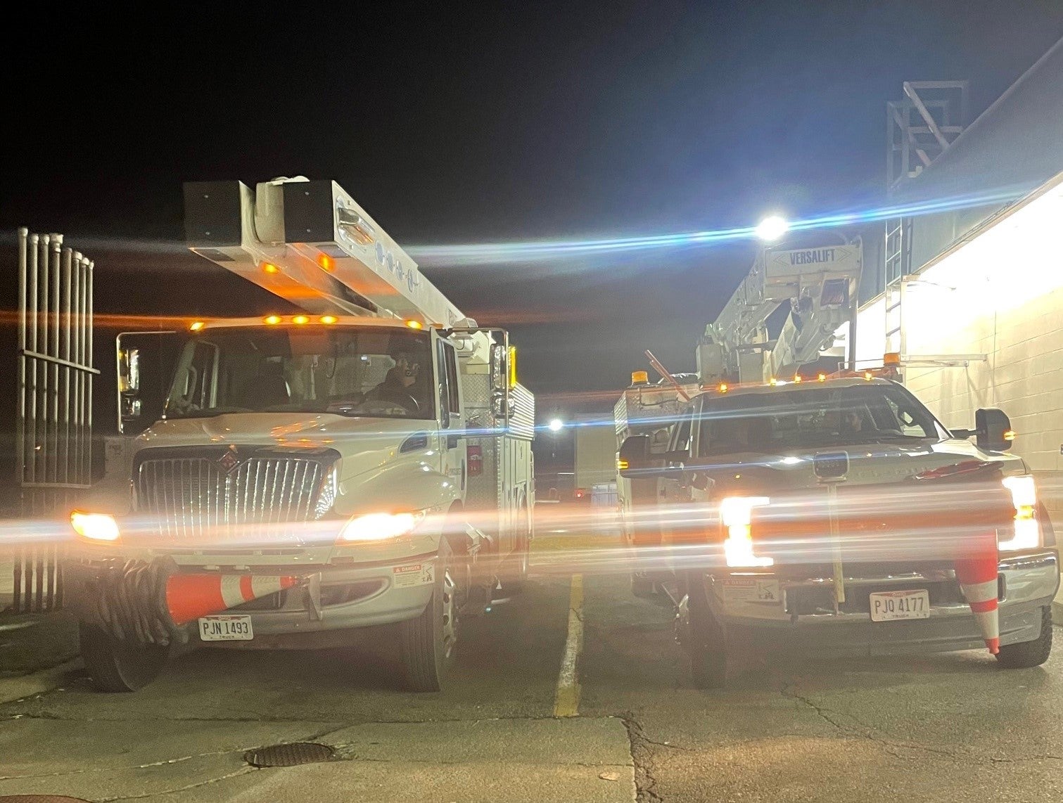 bucket trucks leaving for storm